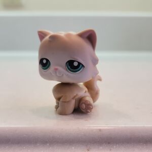 Cute Cat Figurine with Green Eyes